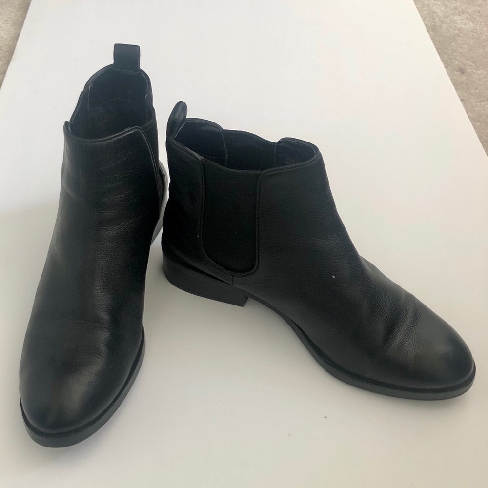A pair of COLE HAAN boots